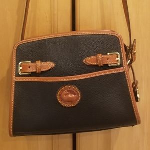 My closet runneth over with designer purses.